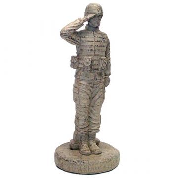 soldier kneeling at cross statue